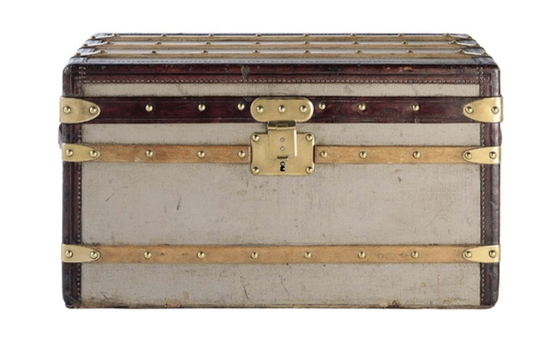 The gray canvas Louis Vuitton trunk